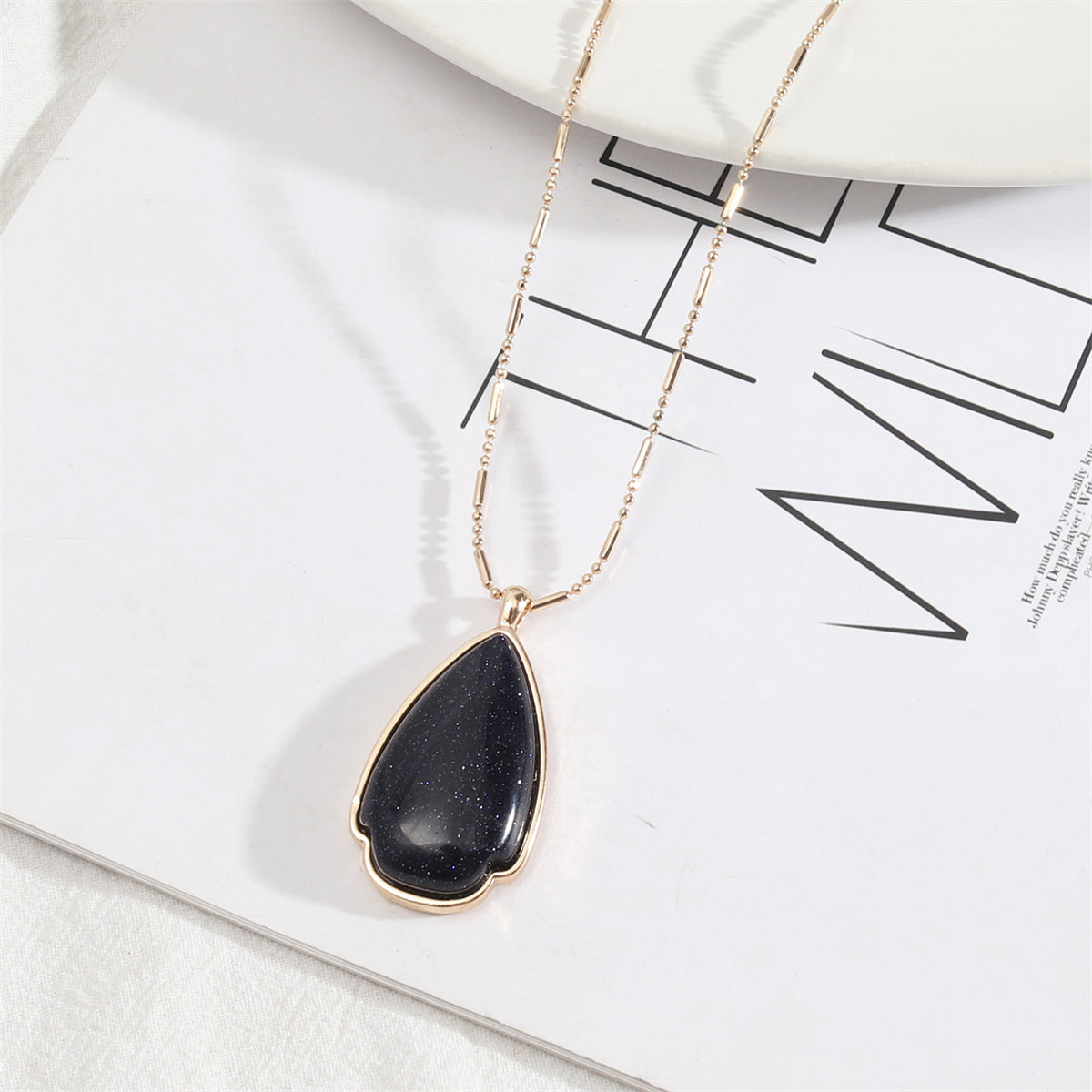 Black Quartz and 18K Gold-Plated Drop Pendant Necklace, gold pendant necklace for women, vintage-inspired design, side view