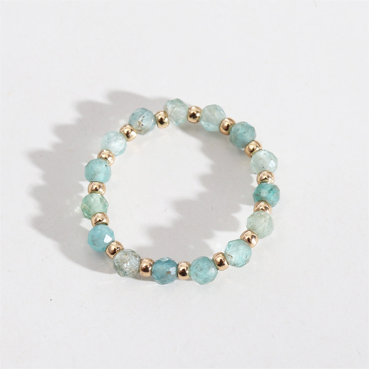 Sea Blue Resin and 18K Gold-Plated Stretch Ring, gold statement rings for women, vintage-inspired design, front view