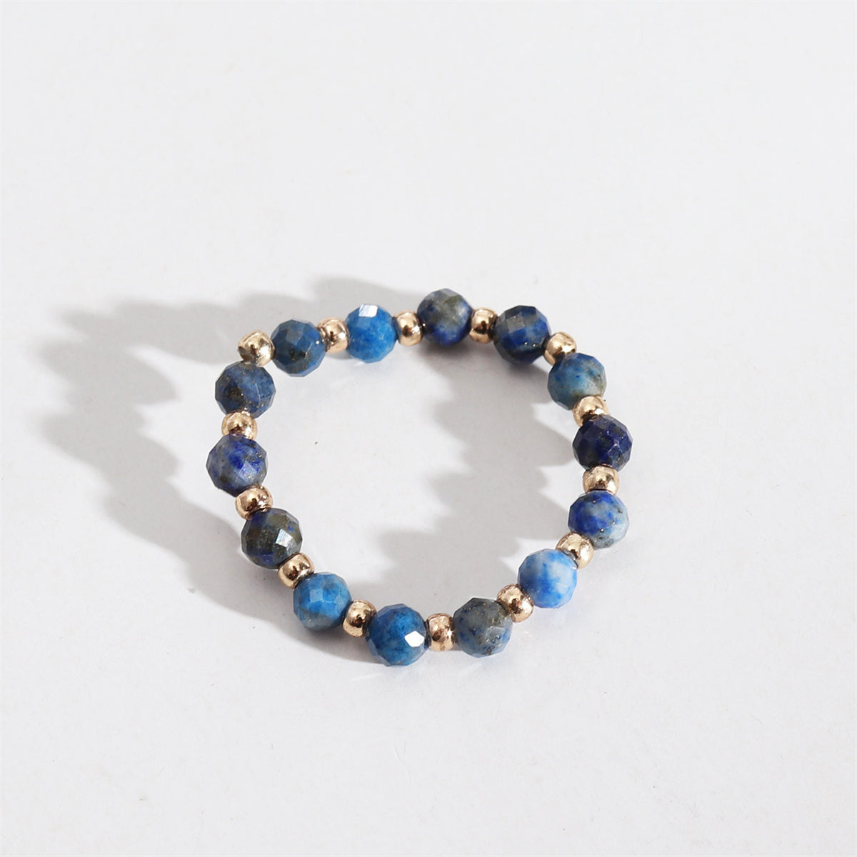 Lapis and 18K Gold-Plated Station Stretch Ring, gold statement rings for women, botanical inspired, front view