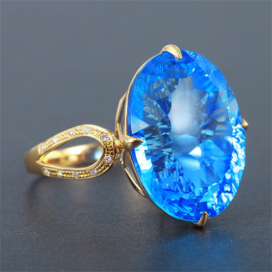 Blue Crystal and 18K Gold-Plated Oval-Cut Adjustable Ring, gold statement rings for women, front view