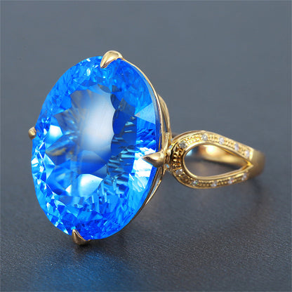 Blue Crystal and 18K Gold-Plated Oval-Cut Adjustable Ring, gold statement rings for women, vintage-inspired design, side view