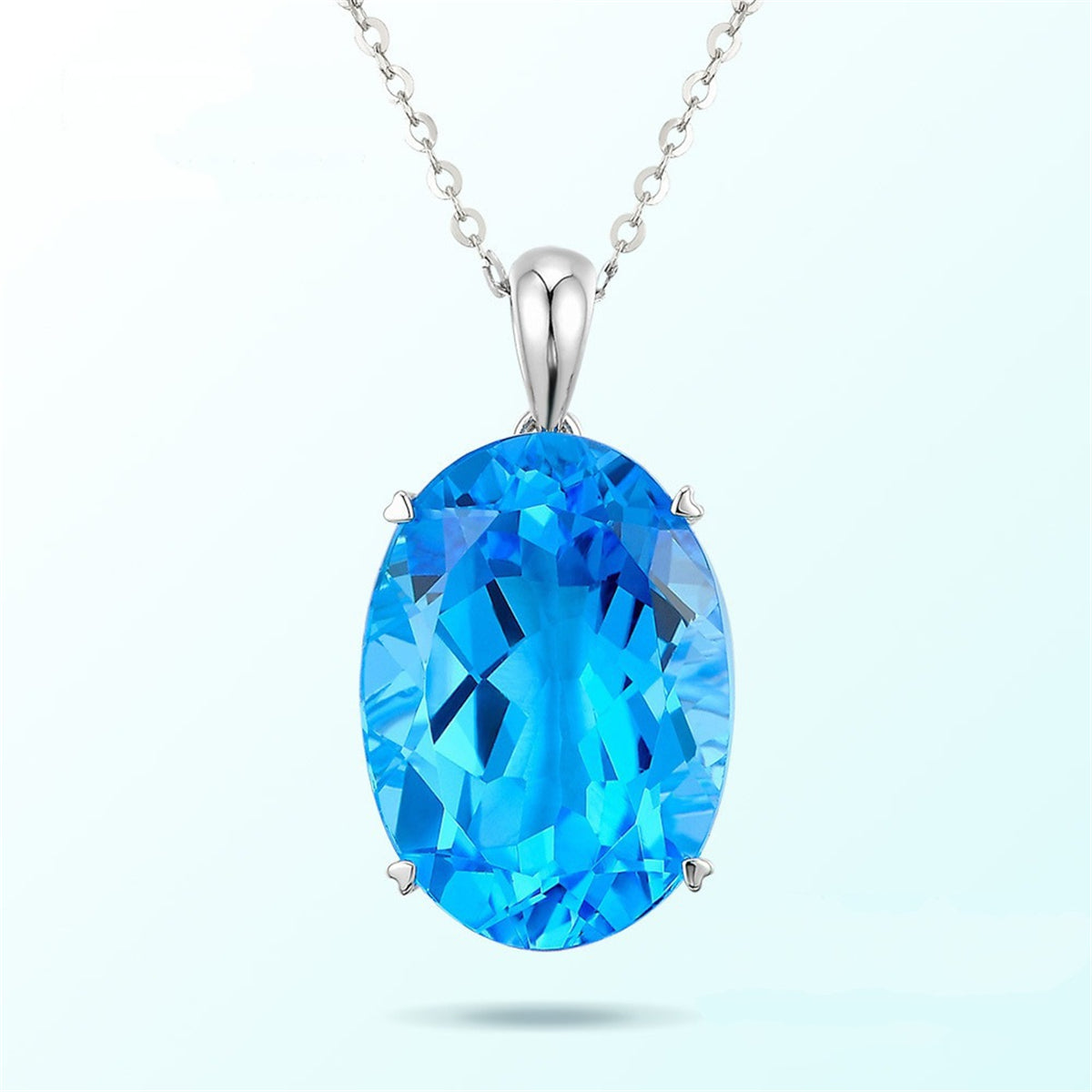 Blue Crystal and Silver-Plated Oval-Cut Pendant Necklace, silver pendant necklace for women, everyday style, side view