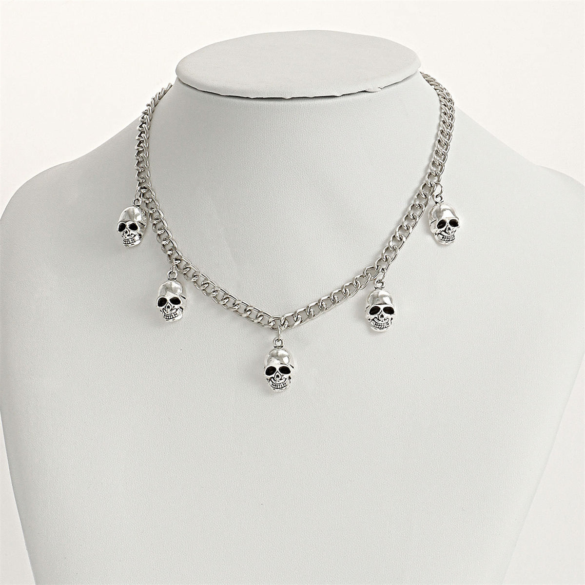 Silver-Plated Skulls Charm Necklace, silver pendant necklace for women, everyday style, detail close-up