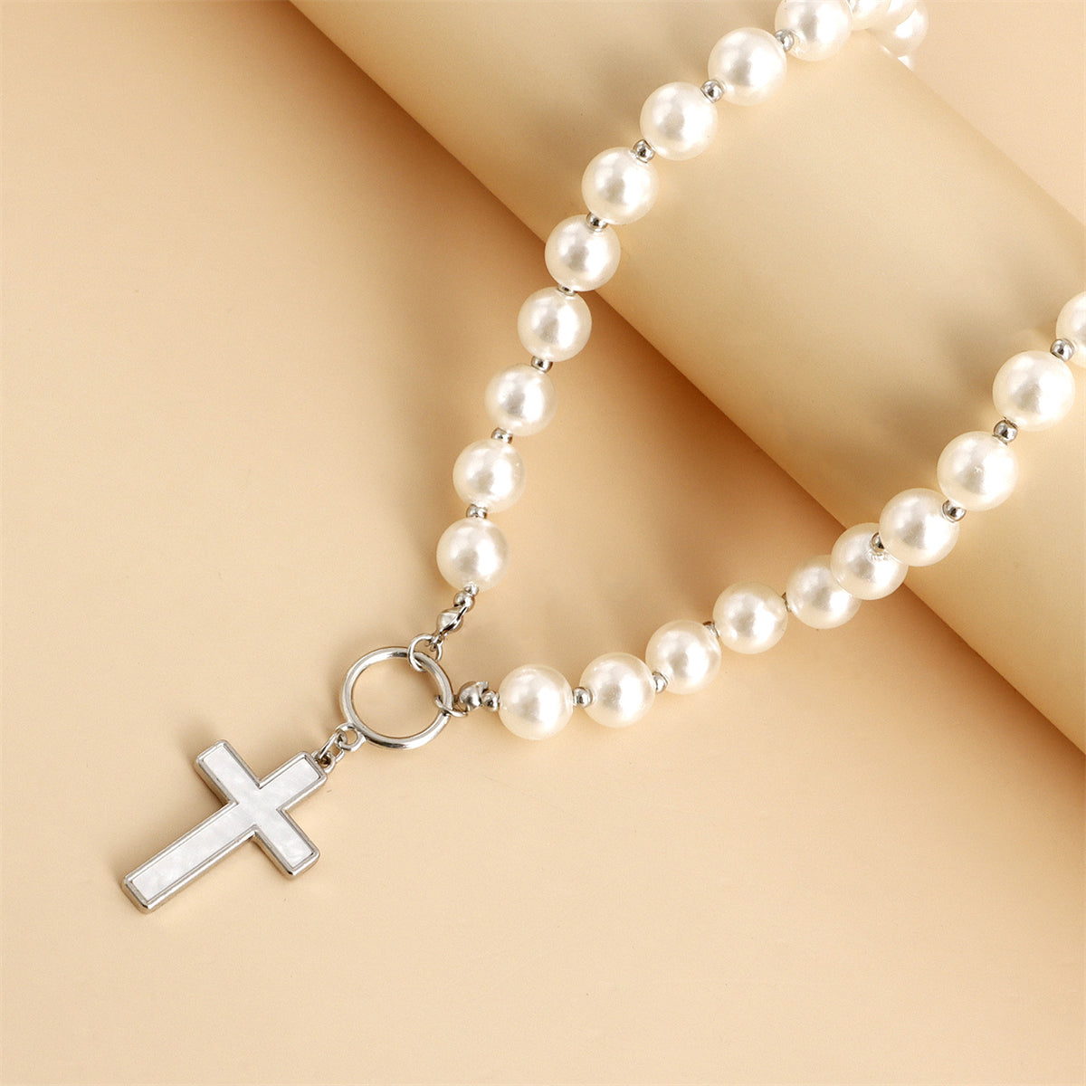 Pearl and Silver-Plated Cross Toggle Necklace, silver pendant necklace for women, dainty minimalist design, lifestyle look