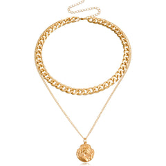 Chic 18K gold-plated curb chain necklace showcasing a coin charm, perfect for layering and enhancing your jewelry collection.
