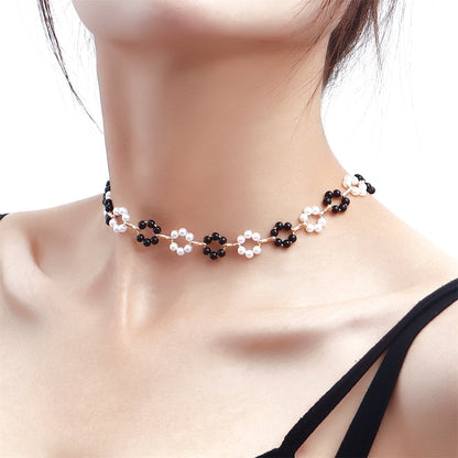 Pearl and Black Resin 18K Gold-Plated Flower Station Necklace, gold pendant necklace for women, botanical inspired, side view