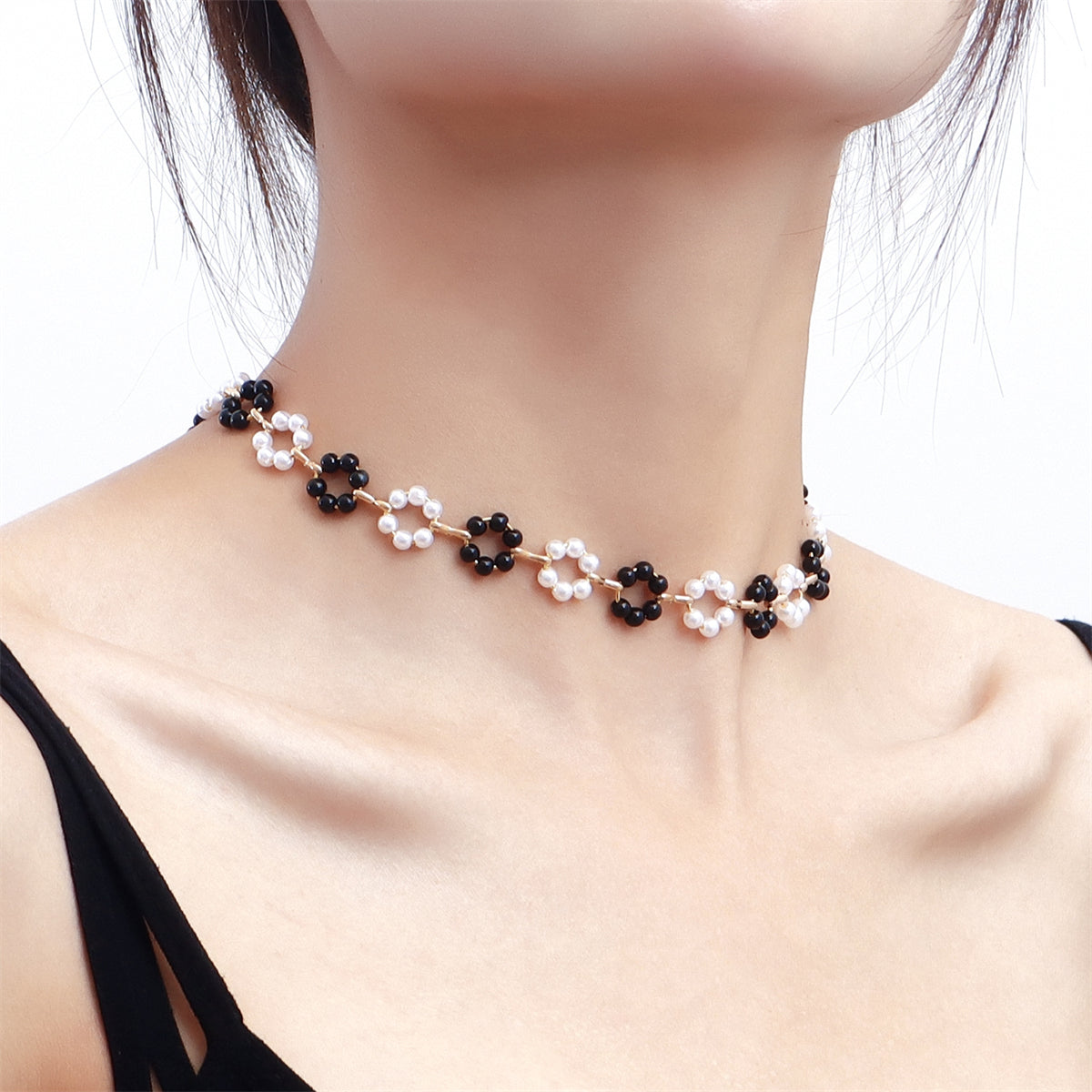 Pearl and Black Resin 18K Gold-Plated Flower Station Necklace, gold pendant necklace for women, detail close-up