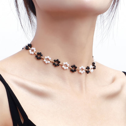 Pearl and Black Resin 18K Gold-Plated Flower Station Necklace, gold pendant necklace for women, detail close-up