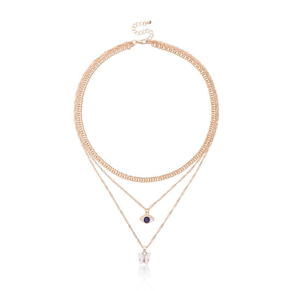 White Acrylic and 18K Gold-Plated Butterfly and Eye Layered Pendant Necklace, gold pendant necklace for..., detail close-up