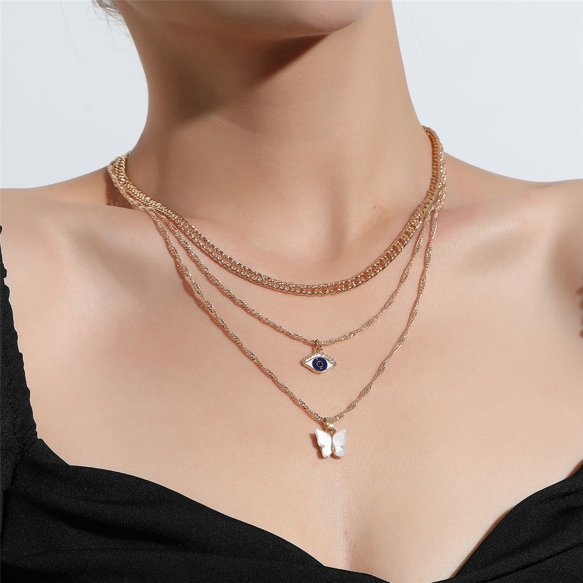 White Acrylic and 18K Gold-Plated Butterfly and Eye Layered Pendant Necklace, gold pendant necklace for women, front view