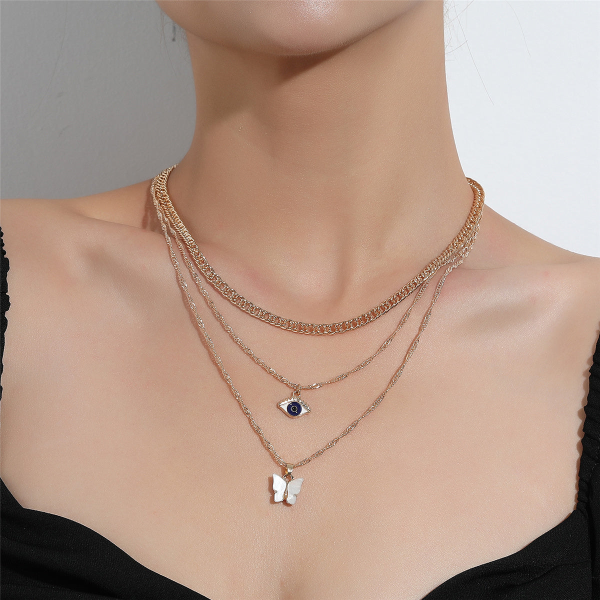 White Acrylic and 18K Gold-Plated Butterfly and Eye Layered Pendant Necklace, gold pendant necklace for women, side view