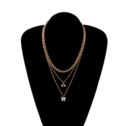White Acrylic and 18K Gold-Plated Butterfly and Eye Layered Pendant Necklace, gold pendant necklace for women, styled look