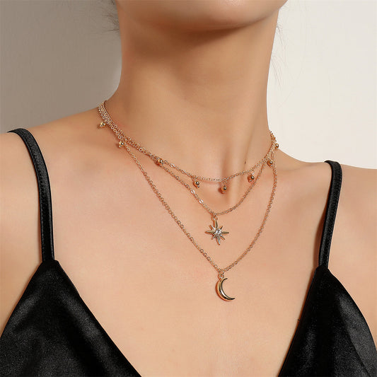 Cubic Zirconia and 18K Gold-Plated Stars Moon Layered Pendant Necklace, gold pendant necklace for women, front view