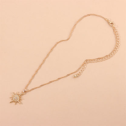 Cubic Zirconia and 18K Gold-Plated Star Pendant Necklace, gold pendant necklace for women, botanical inspired, side view