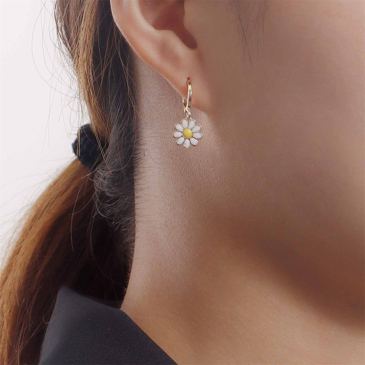 White Enamel and 18K Gold-Plated Daisies Huggie Earrings, gold huggie earrings, dainty minimalist design, lifestyle look