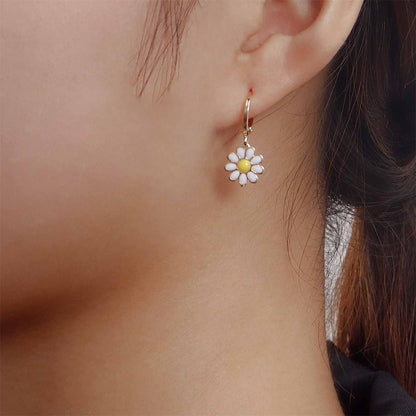 White Enamel and 18K Gold-Plated Daisies Huggie Earrings, gold huggie earrings, dainty minimalist design, detail close-up