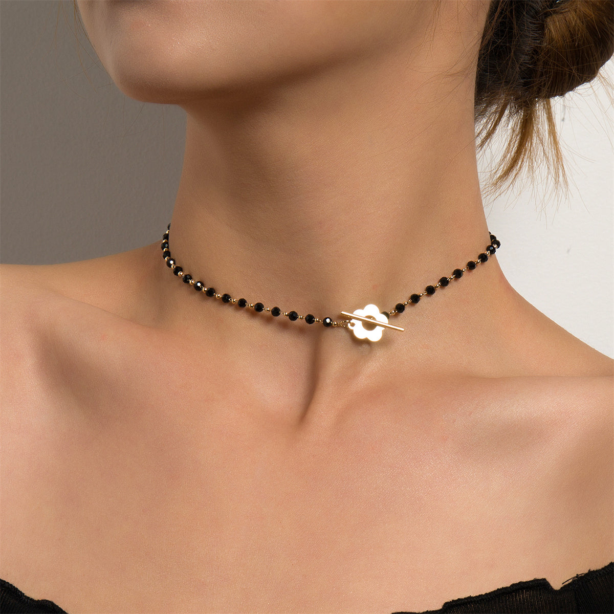 Black Acrylic and 18K Gold-Plated Floral Choker Necklace, chunky gold choker necklace, botanical inspired, side view