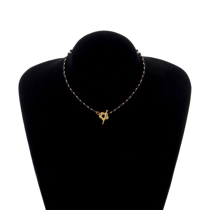 Black Acrylic and 18K Gold-Plated Floral Choker Necklace, chunky gold choker necklace, botanical inspired, lifestyle look