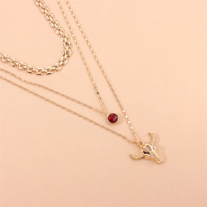 Crystal and 18K Gold-Plated Cattle Layered Pendant Necklace Set, gold pendant necklace for women, detail close-up