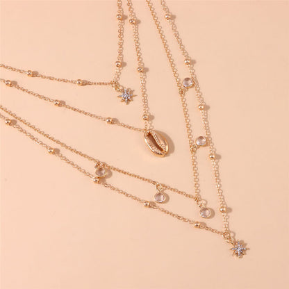 Cubic Zirconia and 18K Gold-Plated Heart Shell Layered Pendant Necklace, gold pendant necklace for women, lifestyle look