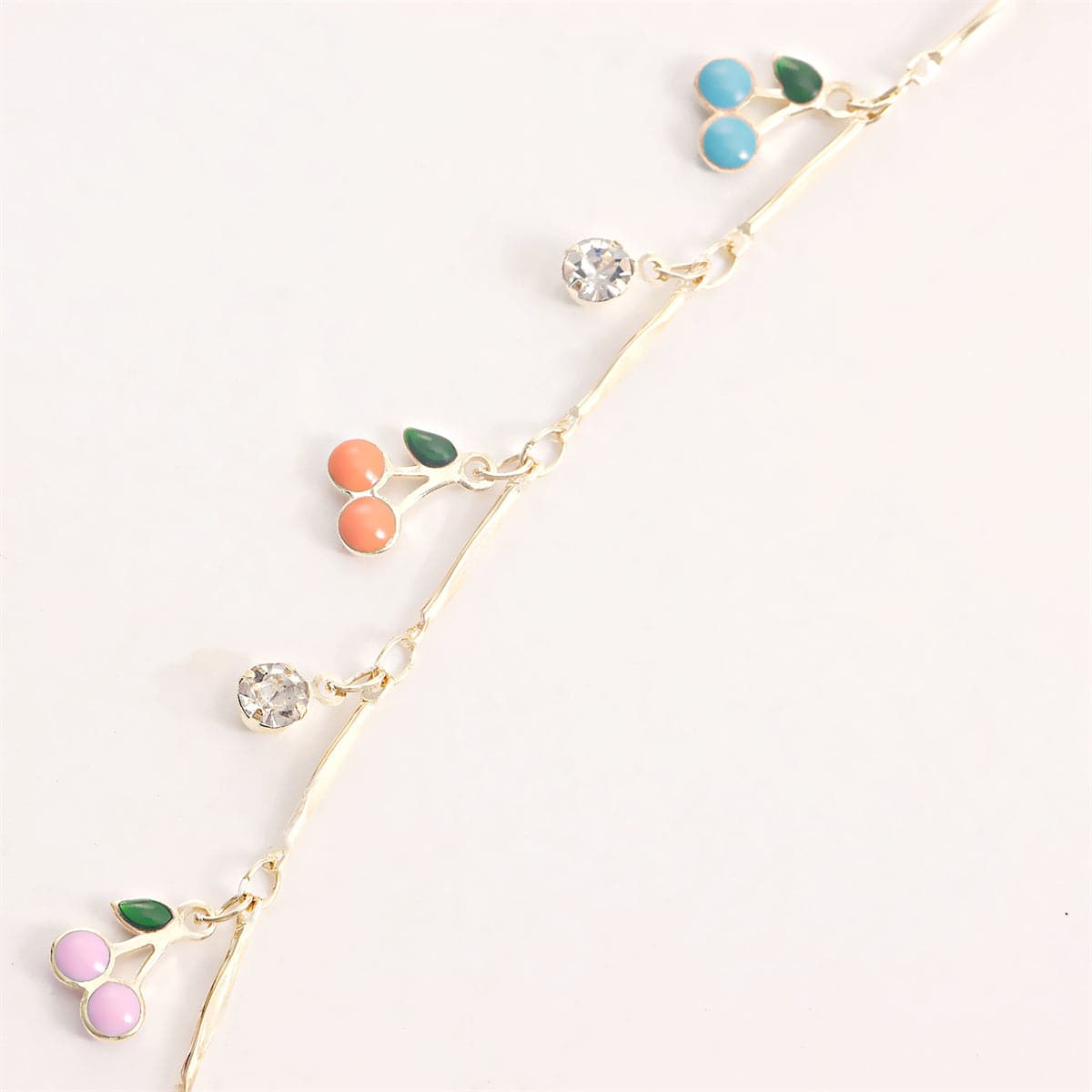 Cubic Zirconia and Enamel 18K Gold-Plated Cherries Station Necklace, gold pendant necklace for women, detail close-up