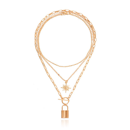 Cubic Zirconia and 18K Gold-Plated Lock Star Layered Pendant Necklace, jewelry gift sets for women, detail close-up