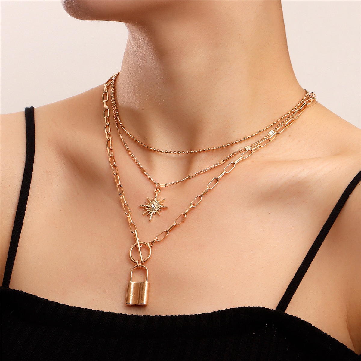 Cubic Zirconia and 18K Gold-Plated Lock Star Layered Pendant Necklace, jewelry gift sets for women, side view