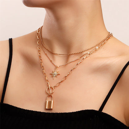 Cubic Zirconia and 18K Gold-Plated Lock Star Layered Pendant Necklace, jewelry gift sets for women, side view