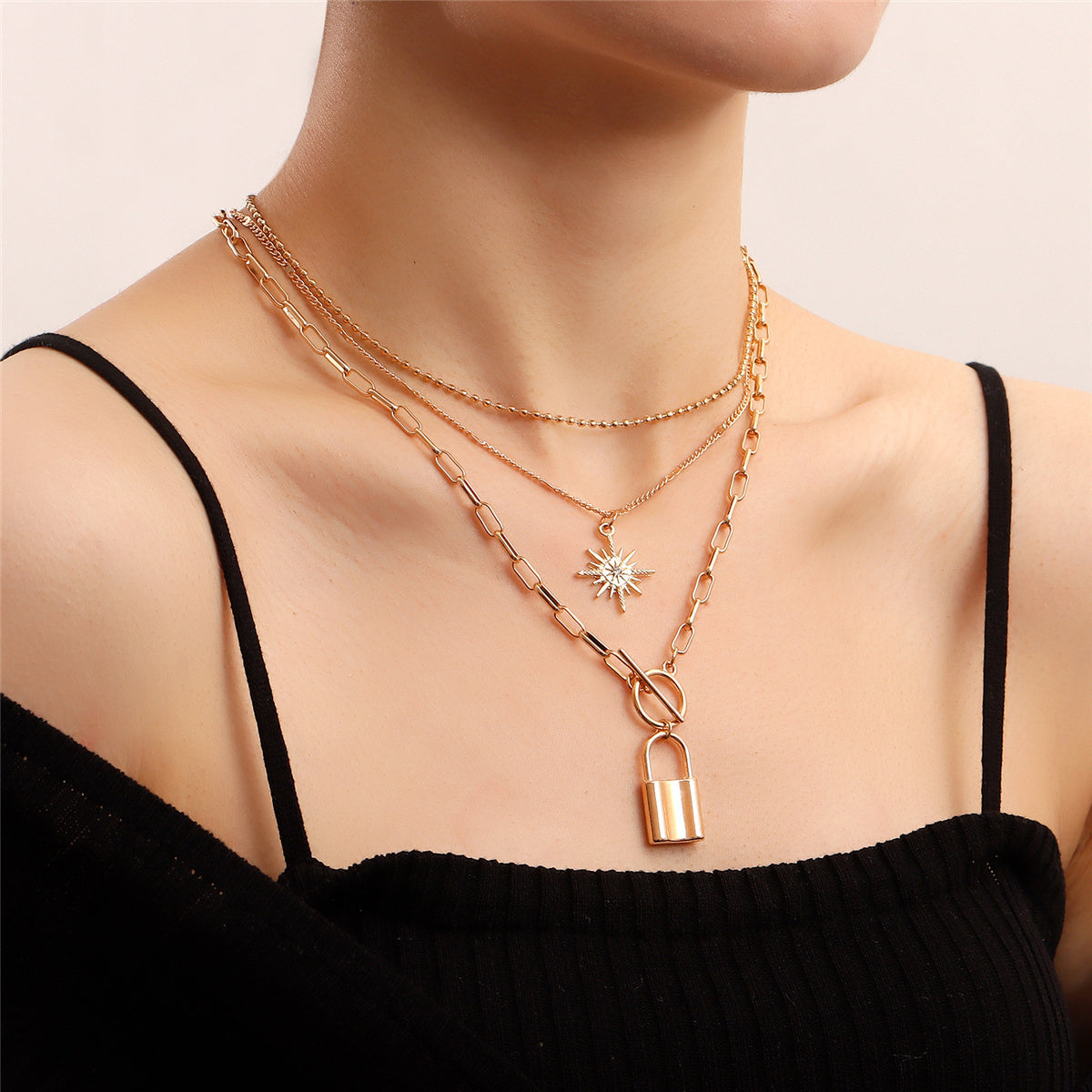 Cubic Zirconia and 18K Gold-Plated Lock Star Layered Pendant Necklace, jewelry gift sets for women, front view