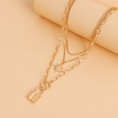 Cubic Zirconia and 18K Gold-Plated Lock Star Layered Pendant Necklace, jewelry gift sets for women, lifestyle look