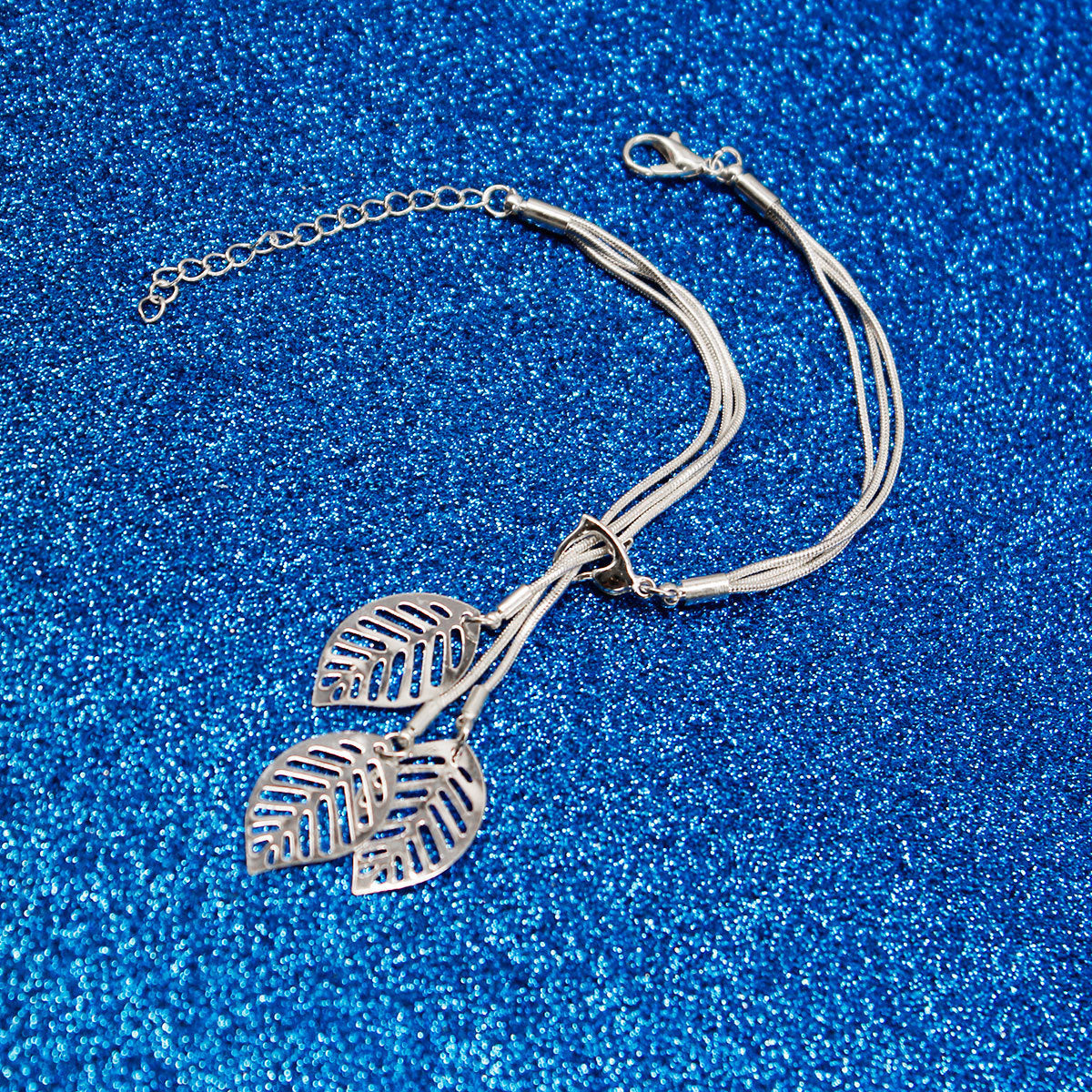 Silver-Plated Leaves Strand Charm Bracelet, silver bracelet for women, dainty minimalist design, detail close-up
