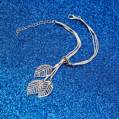 Silver-Plated Leaves Strand Charm Bracelet, silver bracelet for women, dainty minimalist design, detail close-up