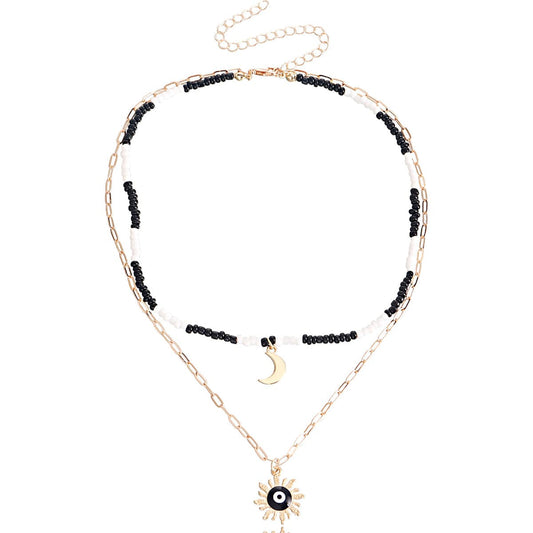 Black Enamel and Howlite 18K Gold-Plated Sun Moon Layered Pendant Necklace, gold pendant necklace for women, front view