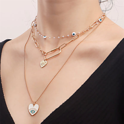 Pearl and Enamel 18K Gold-Plated Eye Heart Pendant Necklace Set, jewelry gift sets for women, botanical inspired, front view
