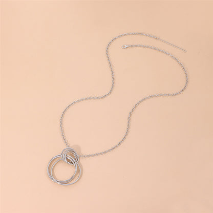 Silver-Plated Interlocked Circle Pendant Necklace, silver pendant necklace for women, everyday style, detail close-up