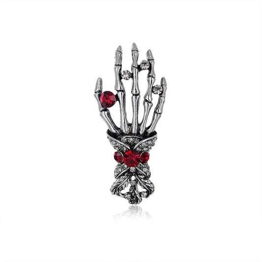 Cubic Zirconia and Silver-Plated Skeleton Hand Brooch, silver brooch pin, dainty minimalist design, front view