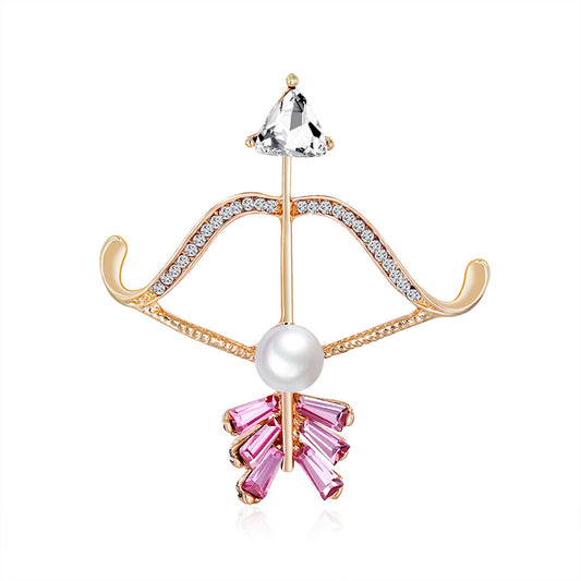 Clear Crystal and Cubic Zirconia Pearl 18k Gold-Plated Bow Arrow Brooch, gold brooch pin, vintage-inspired design, front view