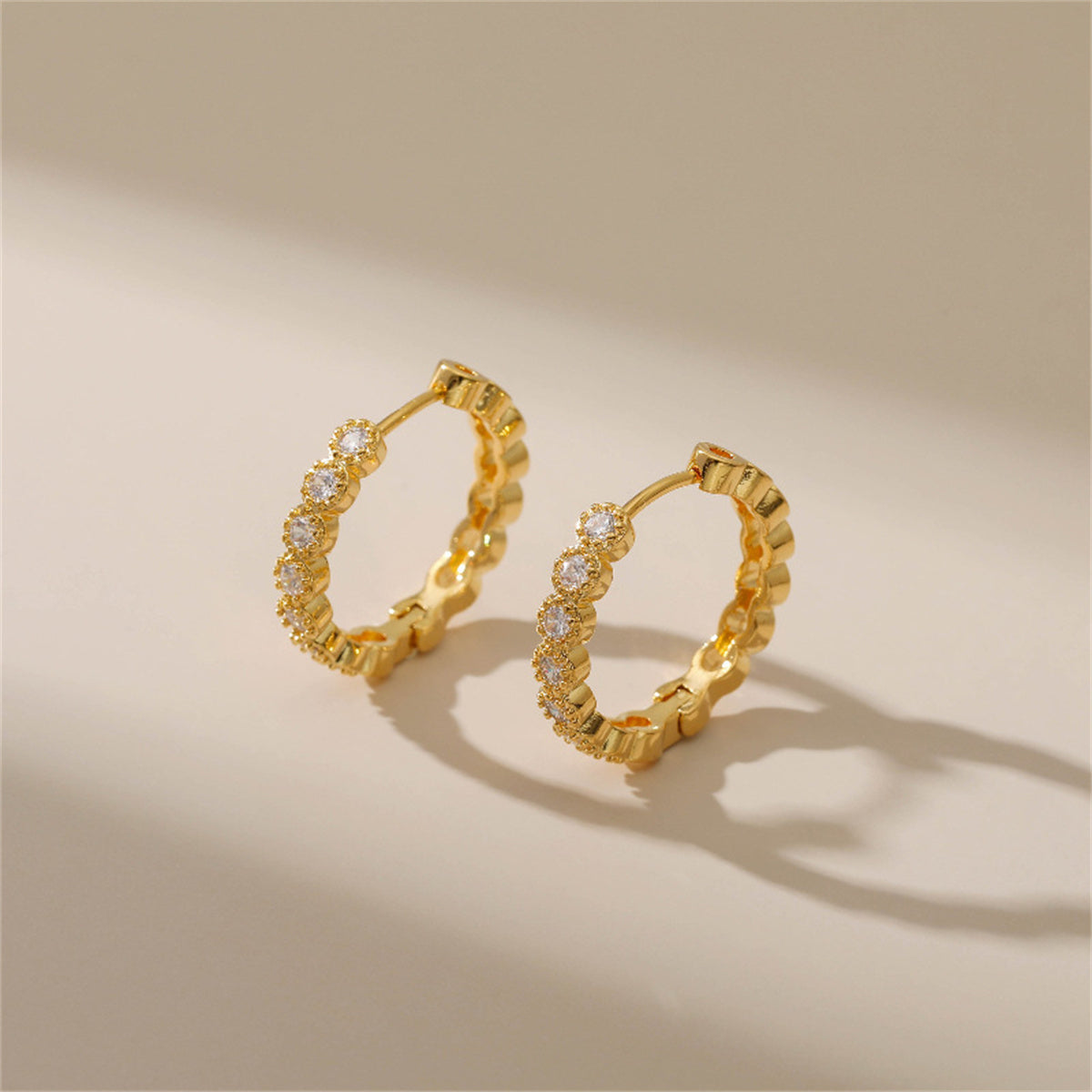 Cubic Zirconia & 18K Gold-Plated Round-Cut Bezel Wave Huggie Earrings