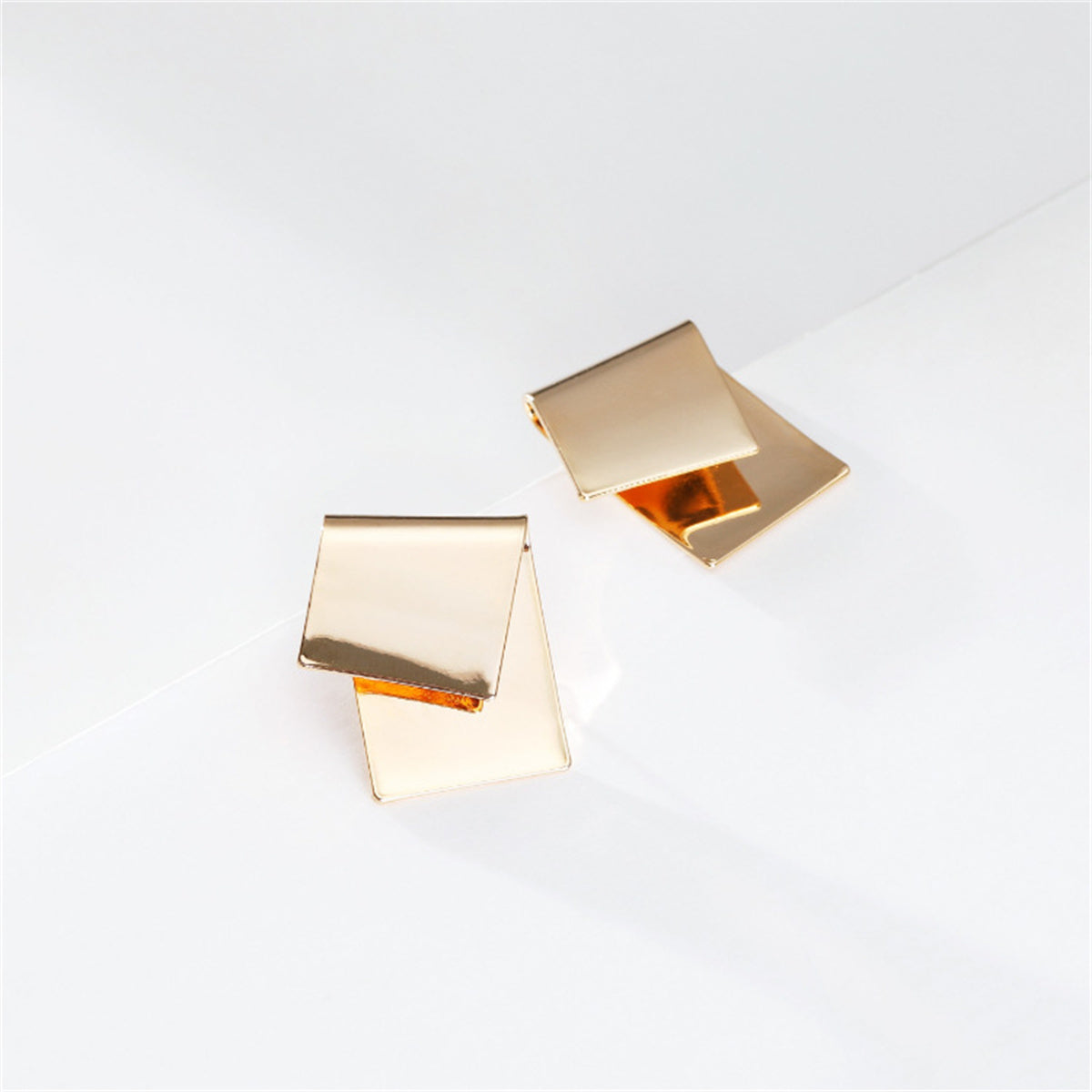 18K Gold-Plated Folded Geometric Stud Earrings, gold stud earrings for women, dainty minimalist design, detail close-up